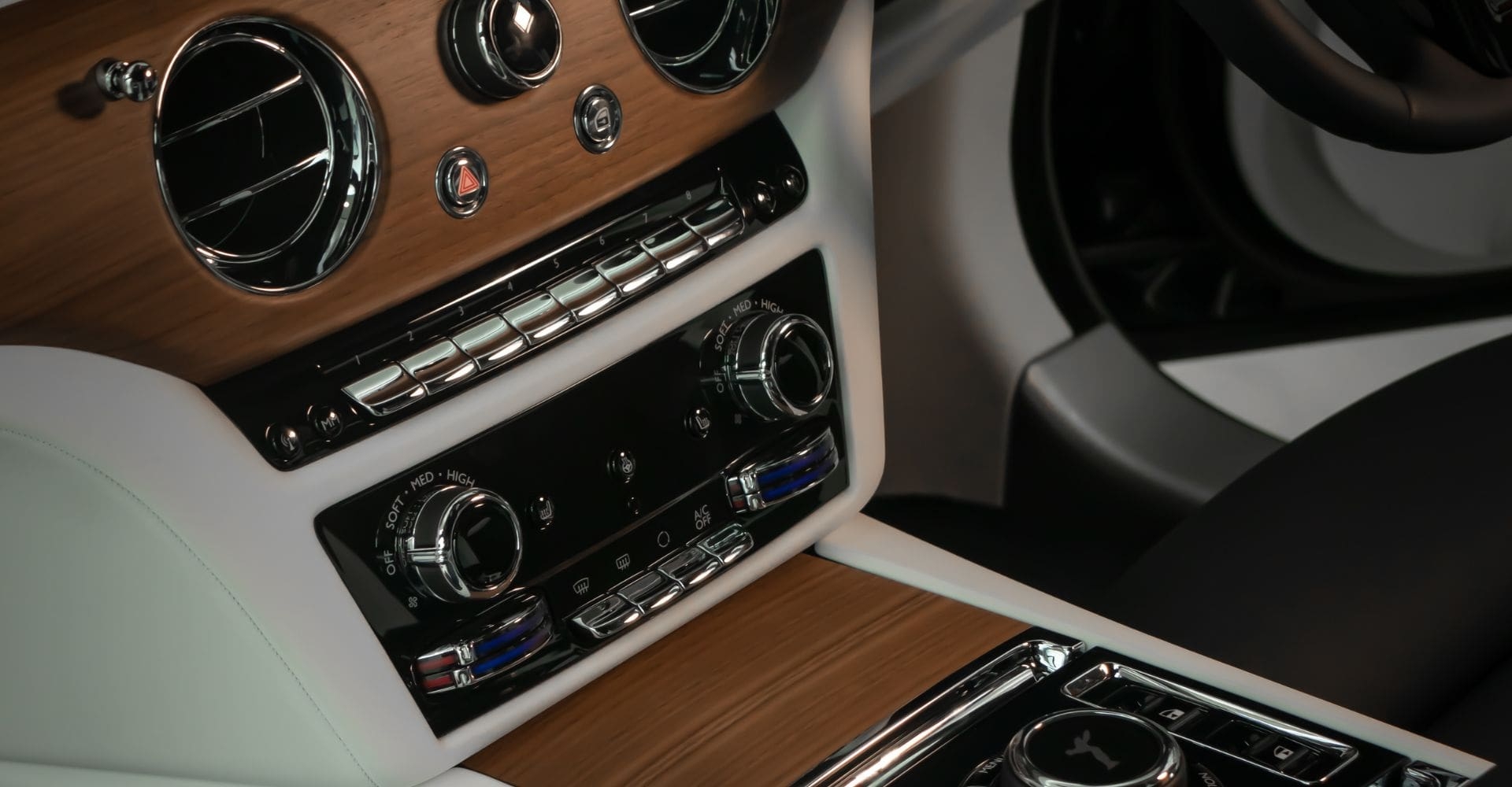 interior of a luxury car with wood panel accents 